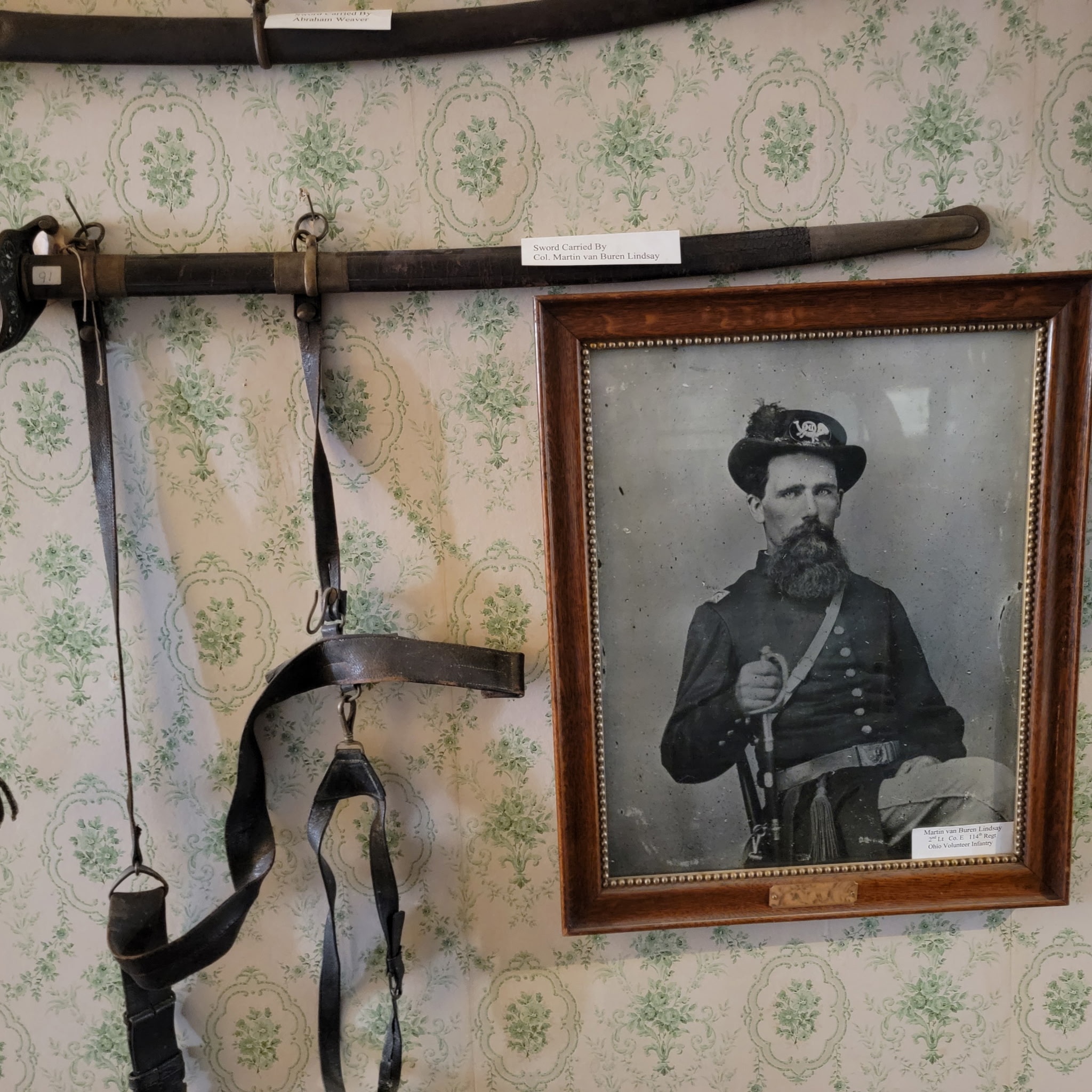 Sword carried by Col. Martin van Buren Lindsay beside his portrait